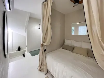 Un ou plusieurs lits dans un hébergement de l'établissement Stylish Souplex - near Palais Royal-Louvre Museum