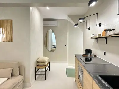 Cuisine ou kitchenette dans l'établissement Stylish Souplex - near Palais Royal-Louvre Museum