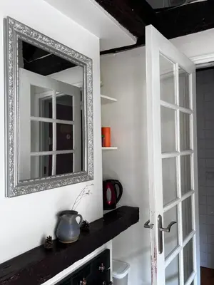Cuisine ou kitchenette dans l'établissement Cosy Saint Paul