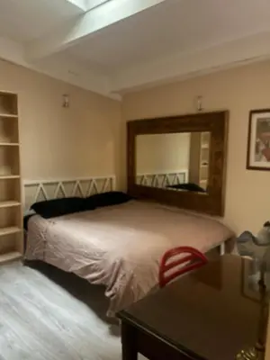 Un ou plusieurs lits dans un hébergement de l'établissement Appartement lumineux Panthéon