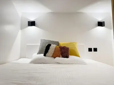 Un ou plusieurs lits dans un hébergement de l'établissement Cosy petit Monparnasse retreat