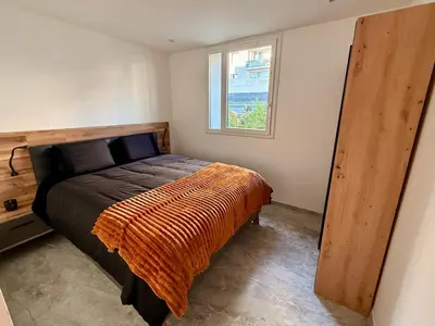 Un ou plusieurs lits dans un hébergement de l'établissement Elegant & Spacious Apartment - Paris 20