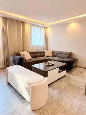 Coin salon dans l'établissement Elegant & Spacious Apartment - Paris 20
