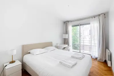 Un ou plusieurs lits dans un hébergement de l'établissement GuestRaedy - Peaceful Parisian Escape