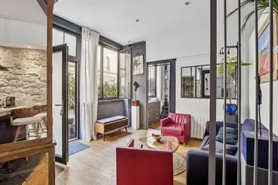 Coin salon dans l'établissement Loft Parisien pour 4 personnes