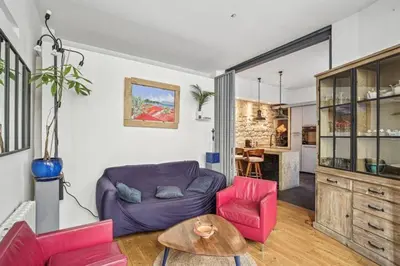 Coin salon dans l'établissement Loft Parisien pour 4 personnes