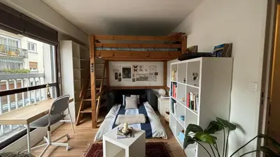 Coin salon dans l'établissement Charmant studio 25m2 à 10min à pied de Montmartre