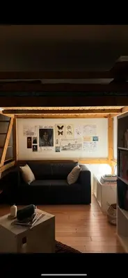 Coin salon dans l'établissement Charmant studio 25m2 à 10min à pied de Montmartre