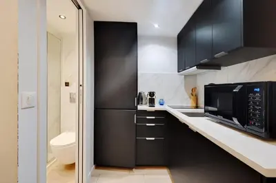 Cuisine ou kitchenette dans l'établissement studio Belleville
