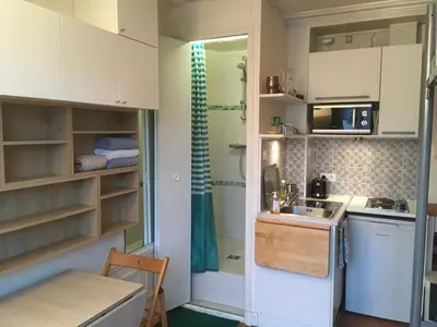 Cuisine ou kitchenette dans l'établissement STUDIO 12ième