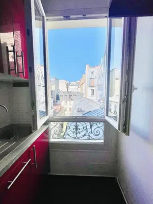 Cuisine ou kitchenette dans l'établissement Appartement Paris 11eme Bastille Voltaire