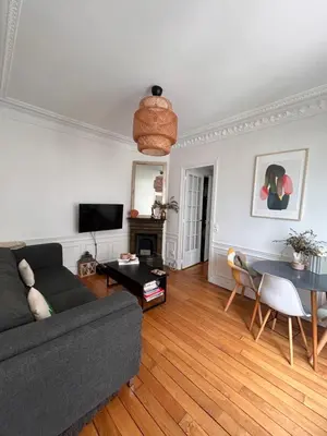 Télévision ou salle de divertissement dans l'établissement Appartement Cœur Passy