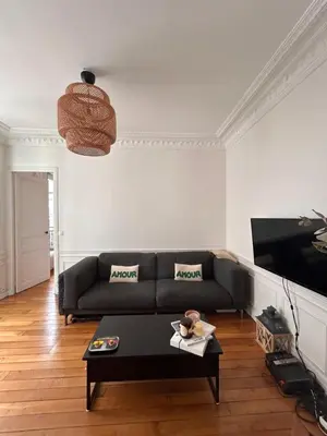 Coin salon dans l'établissement Appartement Cœur Passy