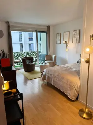 Un ou plusieurs lits dans un hébergement de l'établissement Stylish Studio w Balcony in 16th - Eiffel Tower