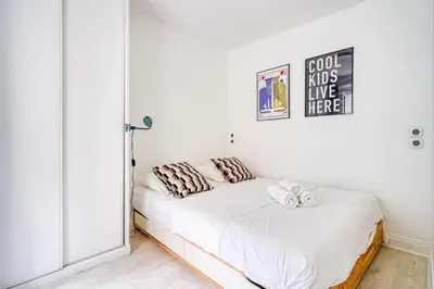 Un ou plusieurs lits dans un hébergement de l'établissement Cozy Apartment 4people - Canal St Martin & République
