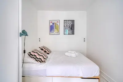 Un ou plusieurs lits dans un hébergement de l'établissement Cozy Apartment 4people - Canal St Martin & République