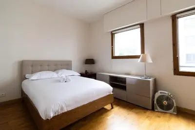 Un ou plusieurs lits dans un hébergement de l'établissement 2-Person Apartment Near Beaugrenelle - III