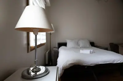 Un ou plusieurs lits dans un hébergement de l'établissement 2-Person Apartment Near Beaugrenelle - III