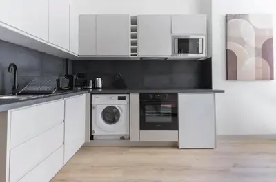 Cuisine ou kitchenette dans l'établissement Appartement de Charme Opera Saint Honore