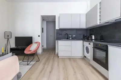 Cuisine ou kitchenette dans l'établissement Appartement de Charme Opera Saint Honore
