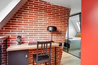 Un ou plusieurs lits dans un hébergement de l'établissement Stylish Nest - Heart of Paris