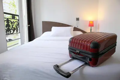 Un ou plusieurs lits dans un hébergement de l'établissement Hotel de la Tour