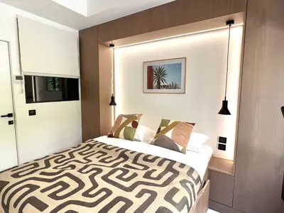Un ou plusieurs lits dans un hébergement de l'établissement Marais Paris - Appartement familial avec 3 chambres et balcon