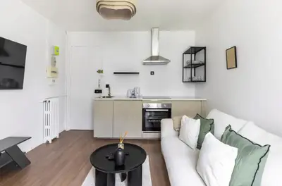 Cuisine ou kitchenette dans l'établissement Vignoles Nation Charming Cosy Studio