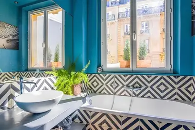 Coin salon dans l'établissement Appartement chic près de l'Arc de Triomphe