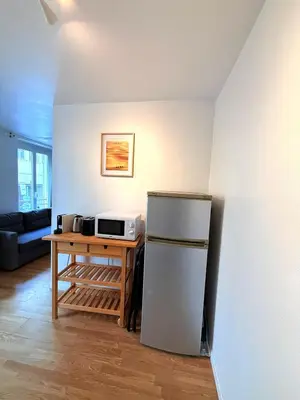 Cuisine ou kitchenette dans l'établissement Appartement Rodier Montmartre Paris