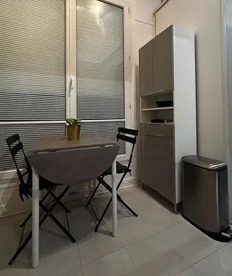 Cuisine ou kitchenette dans l'établissement ARC de TRIOMPHE