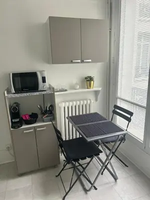 Cuisine ou kitchenette dans l'établissement ARC de TRIOMPHE