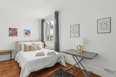 Un ou plusieurs lits dans un hébergement de l'établissement Studio rue Monsieur 2FL - Invalides by B'Your Home
