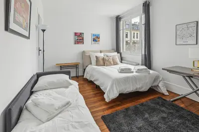 Un ou plusieurs lits dans un hébergement de l'établissement Studio rue Monsieur 2FL - Invalides by B'Your Home