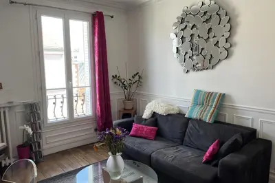 Coin salon dans l'établissement Cozy apartment of 35 m2 at the gates of Paris