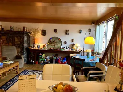 Coin salon dans l'établissement Apartment with air conditioning in Montparnasse