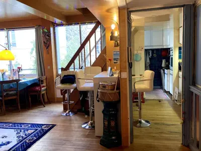 Coin salon dans l'établissement Apartment with air conditioning in Montparnasse
