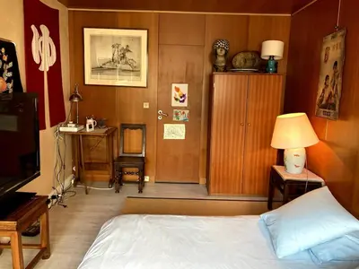 Un ou plusieurs lits dans un hébergement de l'établissement Apartment with air conditioning in Montparnasse