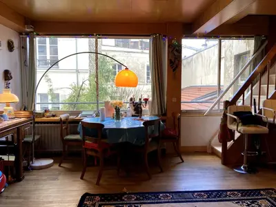 Coin salon dans l'établissement Apartment with air conditioning in Montparnasse