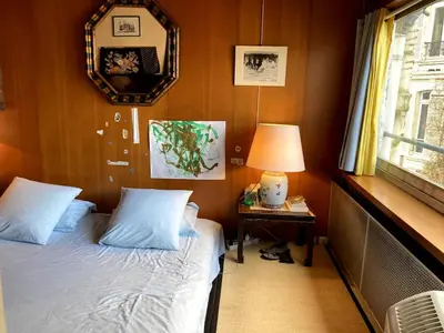 Un ou plusieurs lits dans un hébergement de l'établissement Apartment with air conditioning in Montparnasse
