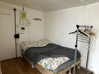 Un ou plusieurs lits dans un hébergement de l'établissement Independent Room Paris 6
