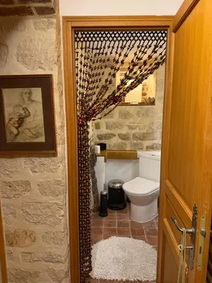Salle de bains dans l'établissement Les Renaudes