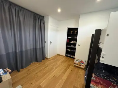 Télévision ou salle de divertissement dans l'établissement Tour Eiffel Trip in Paris