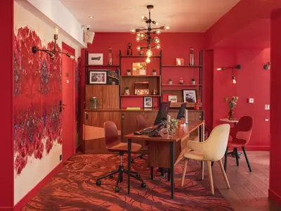 Coin salon dans l'établissement Hôtel Exquis