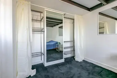 Un ou plusieurs lits dans un hébergement de l'établissement Duplex lumineux avec vue Tour Eiffel - Paris 7e