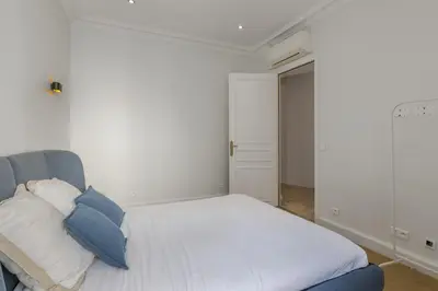 Un ou plusieurs lits dans un hébergement de l'établissement Luxury 5 Bed Residence - Opposite Arc de Triomphe