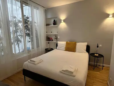 Un ou plusieurs lits dans un hébergement de l'établissement GoodGuest-Paris Sentier Montorgueil Mobility Lease