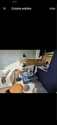 Coin salon dans l'établissement Studio Courbevoie gare La Défense tout équipé !
