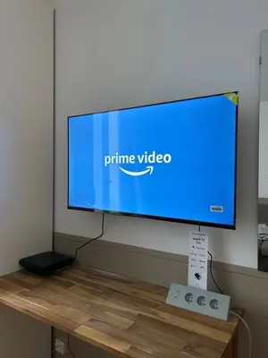 Télévision ou salle de divertissement dans l'établissement Studio aux Portes de Paris
