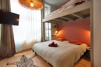 Un ou plusieurs lits dans un hébergement de l'établissement Cozy studio - fully equipped
